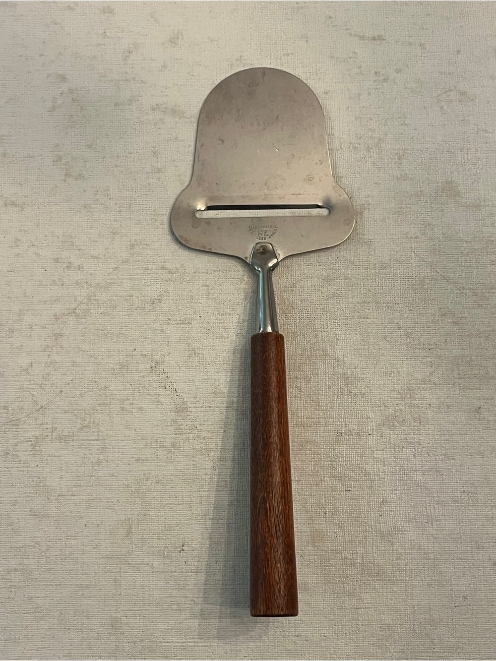 Vintage Mid Century Modern wooden handle cheese slicer. GUC! 
Made in USA.